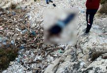 جثة ملقاة على الصخور في الصفرا